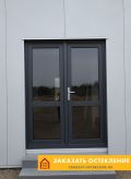Двустворчатые пластиковые двери серого цвета для коттеджа