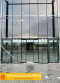 Фасад здания с остеклением алюминиевым профилем