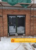 Раздвижная двустворчатая алюминиевая дверь с остеклением