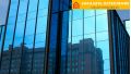 Фасад современного здания со структурным остеклением с использованием энергосберегающих технологий