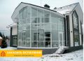 Зимний сад с фасадным панорамным остеклением от пола до потолка