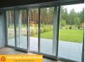 Веранда с раздвижным остеклением в пол