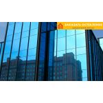 Фасад современного здания со структурным остеклением с использованием энергосберегающих технологий