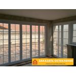 Французские панорамные окна белого цвета с максимальным остеклением для террасы