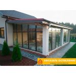 Терраса дома с остеклением витражами с раздвижной системой