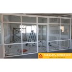 Торговый центр с панорамным остеклением окнами из белого ПВХ профиля