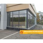 Витрина салона красоты с панорамным остеклением профилем серого цвета