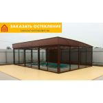 Бассейн с раздвижным панорамным остеклением от пола до потолка