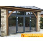 Распашные портальные двери черного цвета с панорамным остеклением в пол