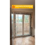 Дверь балконная из пластикового профиля с раздвижным механизмом