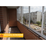 Лоджия с раздвижным остеклением алюминиевым профилем белого цвета