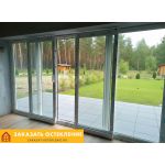 Веранда с раздвижным остеклением в пол