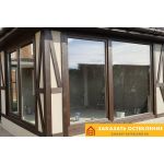 Раздвижное ламинированное окно коричневого цвета