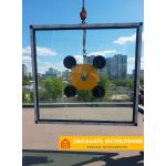 Фасад здания с бесшовным структурным остеклением со скрытыми креплениями