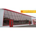 Структурное остекление фасада коммерческого здания из алюминиевого профиля