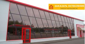 Структурное остекление фасада коммерческого здания из алюминиевого профиля