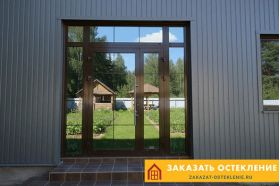Алюминиевая дверь с терморазрывом для загородного дома с панорамным остеклением