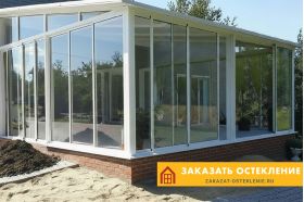 Веранда дома с раздвижным остеклением алюминиевым профилем