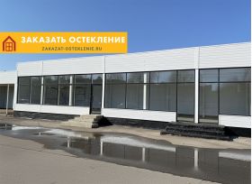 Фасад торгового центра с холодным панорамным остеклением алюминиевым профилем