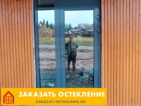 Входные двери с алюминиевым остеклением