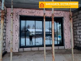 Раздвижные алюминиевые окна черного цвета