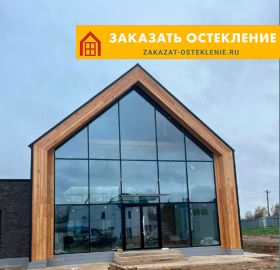 Дом с теплым панорамным остеклением фахверковыми конструкциями