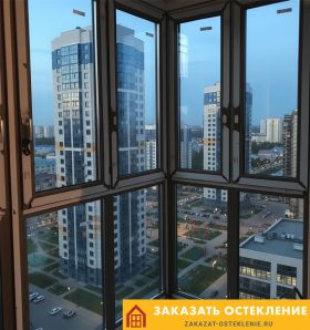 Панорамное остекление квартиры в новостройке с видом на город