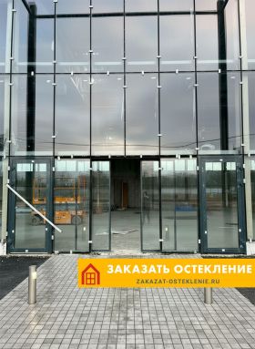 Офис с панорамным раздвижным остеклением алюминиевыми конструкциями