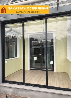 Раздвижной портал  с ламинацией на веранде частного дома