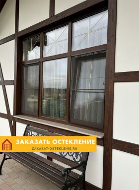 Шумозащитное ламинированное окно коричневого цвета